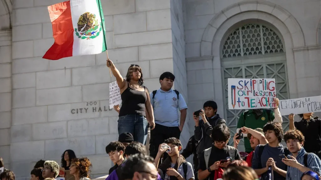The California Remote Teaching Bill is drawing attention across the United States. A new proposal in California could allow some professors who leave the country after immigration action to continue teaching students online. The bill was introduced by Mike Gipson, a Democratic lawmaker from Los Angeles. It focuses on keeping classes running even when faculty members are affected by immigration enforcement. Under the proposal, certain instructors who are no longer in the United States could still teach. They would do so through what the bill calls a “remote teaching arrangement.” This means they could continue their work using online tools and distance learning systems. The California Remote Teaching Bill aims to reduce disruption in community colleges. If a teacher leaves suddenly, students may face delays or canceled courses. Supporters say this measure would help keep learning on track. The plan would apply to faculty working in community college districts. It would cover those who leave the country after January 1, 2027, for specific reasons. These include actions linked to immigration enforcement by the Department of Homeland Security. Supporters argue the bill is about continuity in education. The Faculty Association of California Community Colleges has backed the proposal. The group says it would protect student learning and avoid sudden breaks in teaching. They add that online tools make remote instruction possible. Many colleges already use digital platforms for classes. This makes it easier for teachers to stay connected with students from different locations. The California Remote Teaching Bill comes at a time of wider debate on immigration and education. Schools and colleges are adjusting policies as enforcement actions affect students and staff. Some institutions have already moved classes online during periods of uncertainty. Data also shows that immigrant educators play a key role in the US system. Research from George Mason University estimates there are over 800,000 immigrant teachers in the country. A large share of them work in higher education. However, the proposal has also raised questions. Critics argue that it may create legal and policy challenges. They point to issues such as employment rules, accreditation standards, and oversight of remote teaching from outside the country. Some experts say the bill may need clear guidelines. These could include how performance is tracked and how institutions ensure quality education. Others note that cross-border work can raise tax and regulatory concerns. The California Remote Teaching Bill reflects a broader shift toward digital education. Online learning has grown rapidly in recent years. Many colleges now offer flexible options for both students and teachers. Still, the debate shows that technology alone does not solve all issues. Lawmakers must balance access to education with legal frameworks. This is especially important in areas like immigration policy. At present, the bill is still under review. Lawmakers will discuss its details before any final decision. Public opinion and expert input are likely to shape the outcome. The California Remote Teaching Bill highlights how education systems are adapting to change. It shows the growing role of online learning in keeping classrooms active. At the same time, it raises key questions about policy, law, and fairness. As discussions continue, students, teachers, and institutions will watch closely. The final decision could set an example for other states facing similar challenges.
